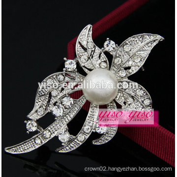 elegant diamond leaf brooch